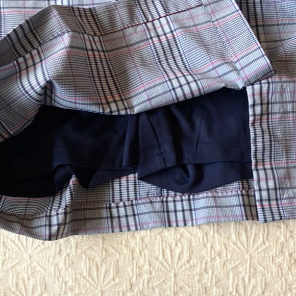 Plaid skort in blue black purple white and red with navy stretch shorts attached - Picture 8 of 13